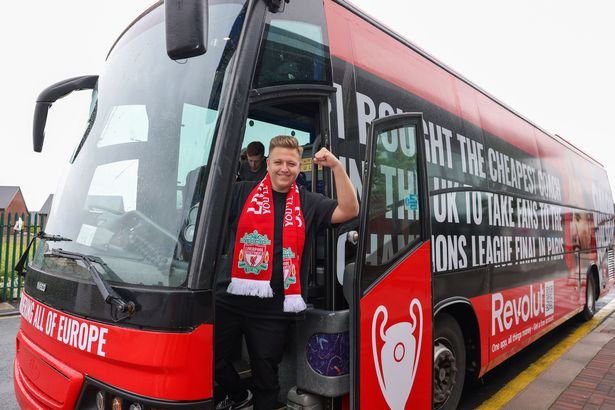 Youtuber-Simon-Wilson-with-the-bus-he-has-hired-to-take-Liverpool-fans-to-Paris-for-the-UCL-final